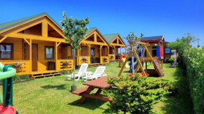 Holzhaus in Ustronie Morskie mit Grill und Garten in Ustronie Morskie
